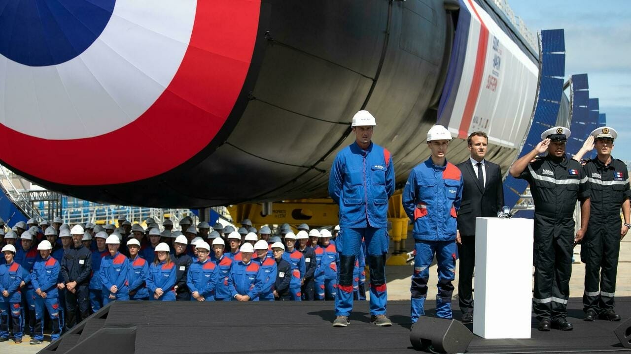 French President Emmanuel Macron attends the official launch ceremony of the new French nuclear submarine "Suffren" in Cherbourg, northwestern France, 12 July 2019. French President Emmanuel Macron attends the official launch ceremony of the new French nuclear submarine "Suffren" in Cherbourg, northwestern France, 12 July 2019.