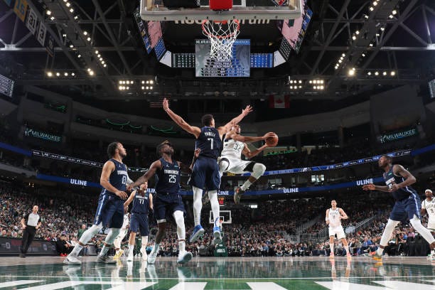 Giannis Antetokounmpo of the Milwaukee Bucks drives to the basket during the game against the Dallas Mavericks on April 3, 2022 at the Fiserv Forum...