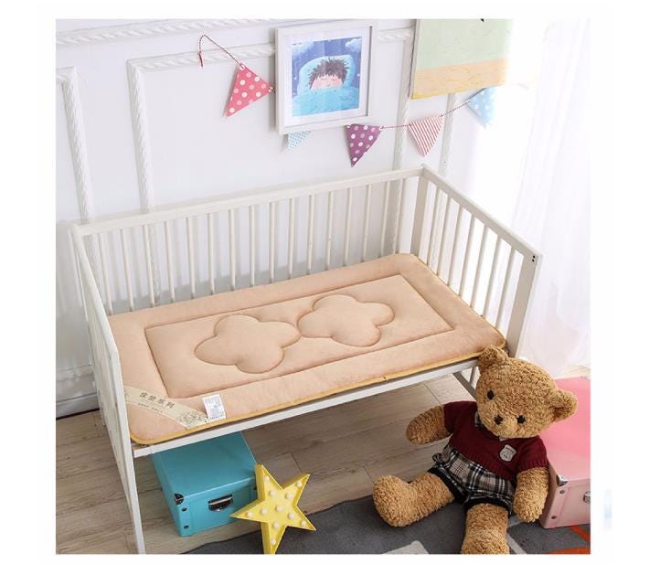 cot bed with mattress and top changer