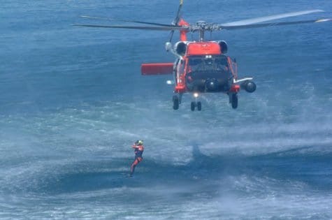 SEATTLE (Aug. 8, 2004) A rescue swimmer jumps from an HH-60 Jayhawks helicopter, from Coast Guard AIr Station Astoria, Ore., during a rescue drill performed for federal and state officials. USCG photo by PA3 Adam Eggers. SEATTLE (Aug. 8, 2004) A rescue swimmer jumps from an HH-60 Jayhawks helicopter, from Coast Guard AIr Station Astoria, Ore., during a rescue drill performed for federal and state officials. USCG photo by PA3 Adam Eggers.