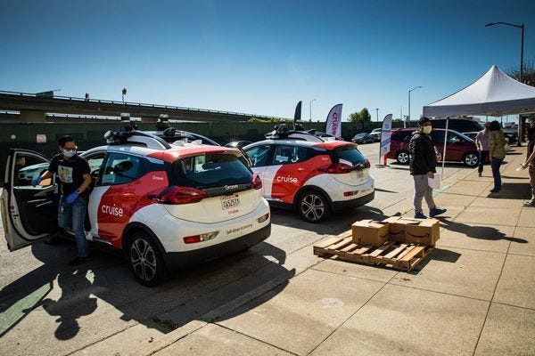 Cruise’s cars delivering meals to those in need. Cruise’s cars delivering meals to those in need.