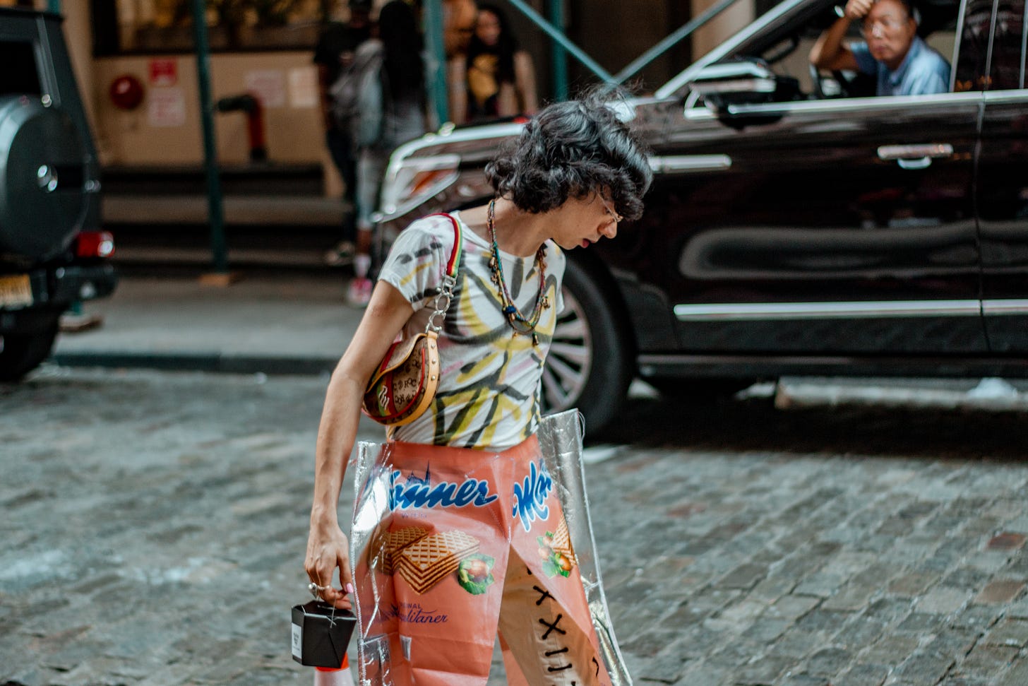  A man in his creative costume (pants printed with wafer brand) in New York: A photo by David Elikwu