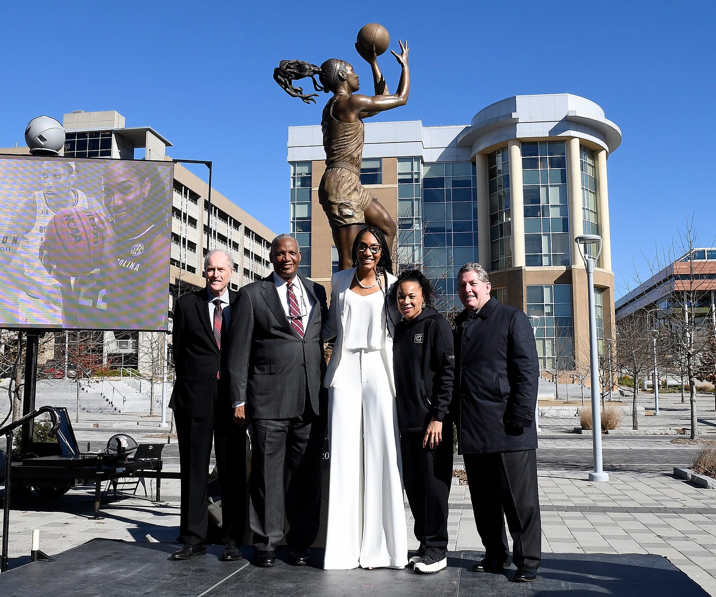 A’ja Wilson, Dawn Staley and others in front of forever A’ja. (Photo courtesy of South Carolina Athletics)