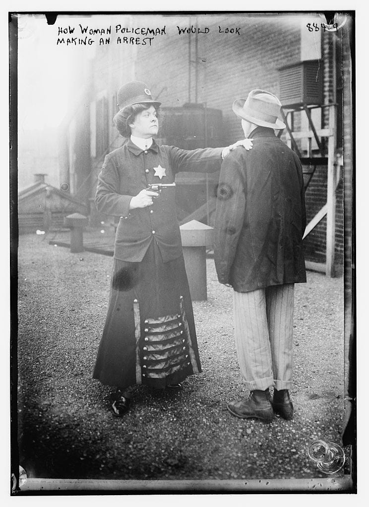 How a Woman Policeman Would Look Making an Arrest (1909)