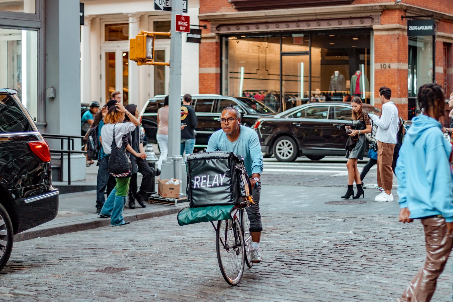A Relay delivery man on his bicycle in New York: A photo by David Elikwu 