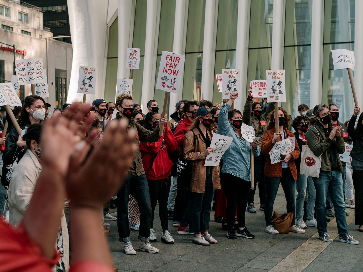 New Yorker staffers and supporters rally for a fair contract at the World Trade Center. New Yorker staffers and supporters rally for a fair contract at the World Trade Center.
