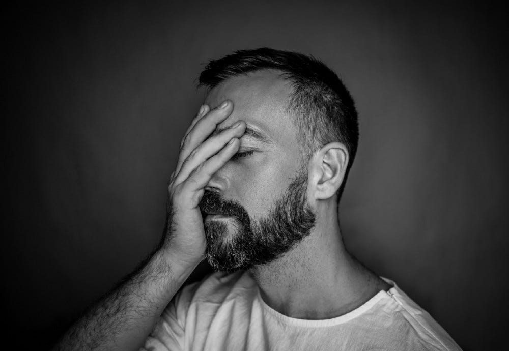 A man overthinking A man overthinking