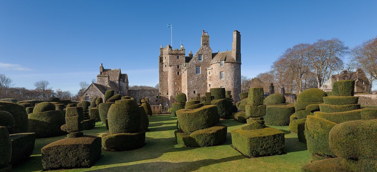 Picture of topiary and the exterior of Earlshall Castle