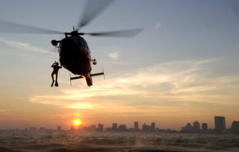 Atlantic City, NJ ( Sept. 18, 2006)--A Coast Guard rescue swimmer from Air Station Atlantic City prepares to enter the water off of Atlantic City, NJ, during a water rescue training exercise Sept. 18, 2006. U.S. Coast Guard photo by PAC Tom Sperduto Atlantic City, NJ ( Sept. 18, 2006)--A Coast Guard rescue swimmer from Air Station Atlantic City prepares to enter the water off of Atlantic City, NJ, during a water rescue training exercise Sept. 18, 2006. U.S. Coast Guard photo by PAC Tom Sperduto