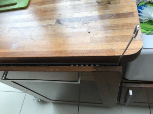 image of my dishwasher with a kebab skewer holding the door closed image of my dishwasher with a kebab skewer holding the door closed