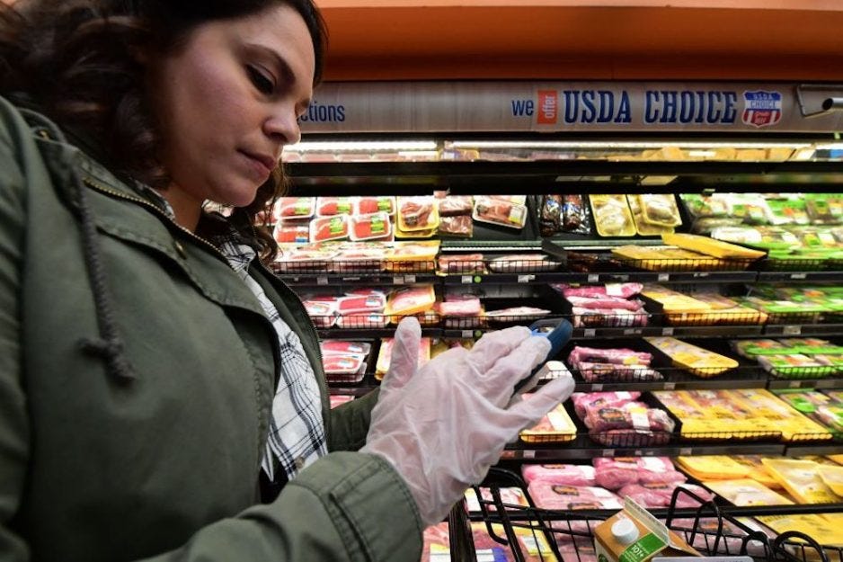 Instacart shopper checking phone