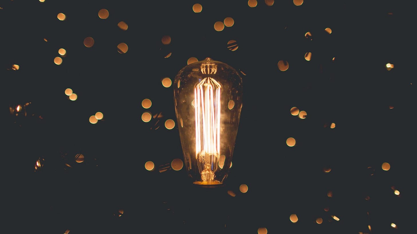 A cool lightbulb surrounded by glimmerings. A cool lightbulb surrounded by glimmerings.
