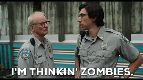 One cop (Bill Murray) watches another (Adam Driver) shake his head and say, "I'm thinkin zombies." From The Dead Don't Die. [gif]