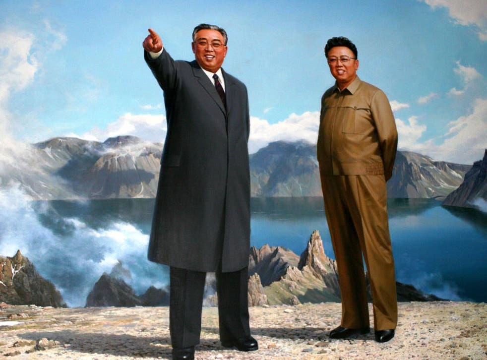 Kim Jong-il, right, and his father, Kim Il-sung, depicted at Mount Paektu, where the pair were both born, according to official records