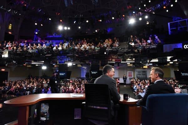 Jake Tapper, right, an in-demand late-night guest, on a recent episode of “The Late Show With Stephen Colbert.”