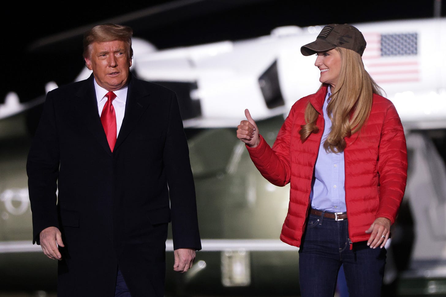 U.S. President Donald Trump arrives with Sen. Kelly Loeffler (R-GA) at a campaign rally at Dalton Regional Airport January 4, 2021 in Dalton, Georgia. Trump campaigned for Loeffler and Sen. David Perdue (R-GA) ahead of tomorrow’s run-off elections in Georgia. (Photo by Alex Wong/Getty Images) U.S. President Donald Trump arrives with Sen. Kelly Loeffler (R-GA) at a campaign rally at Dalton Regional Airport January 4, 2021 in Dalton, Georgia. Trump campaigned for Loeffler and Sen. David Perdue (R-GA) ahead of tomorrow’s run-off elections in Georgia. (Photo by Alex Wong/Getty Images)
