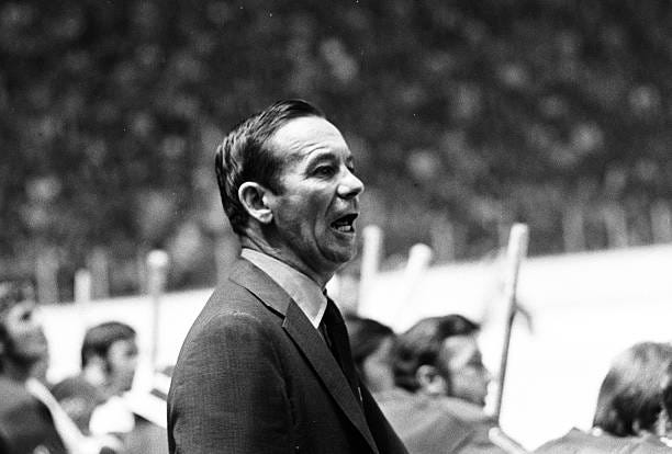 Head Coach Emile Francis of the New York Rangers follows the action from the bench Circa 1972 at the Montreal Forum in Montreal, Quebec, Canada.