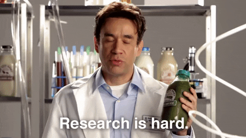 Gif of Fred Armisen shaking his head with the words "research is hard."