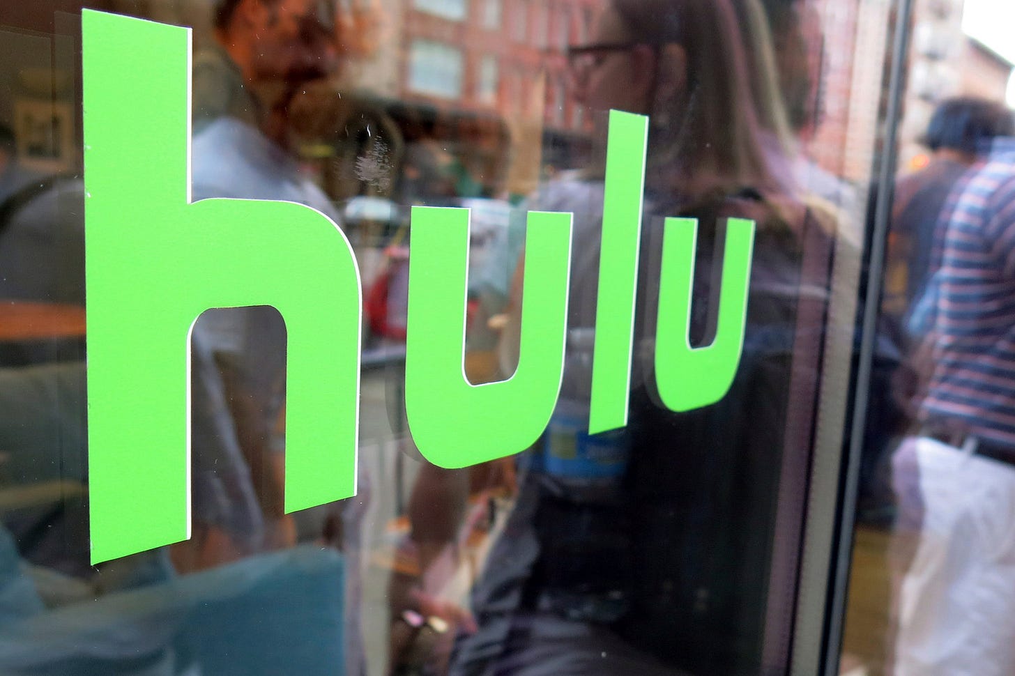 Disney to Buy Comcast's Hulu Stake and Take Full Control of ...