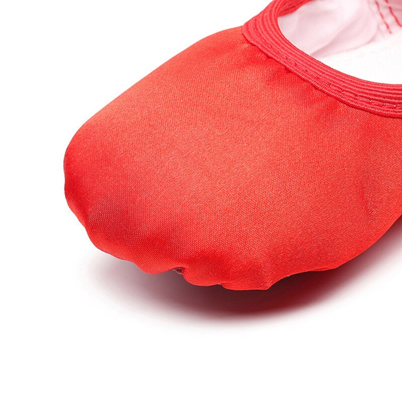 red ballet slippers with ribbons