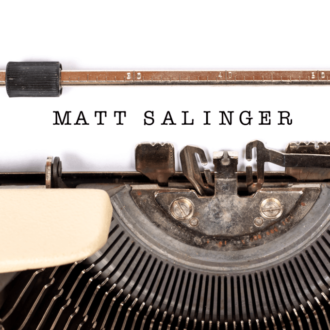 A typewriter with the name, Matt Salinger, typed onto white paper. A typewriter with the name, Matt Salinger, typed onto white paper.