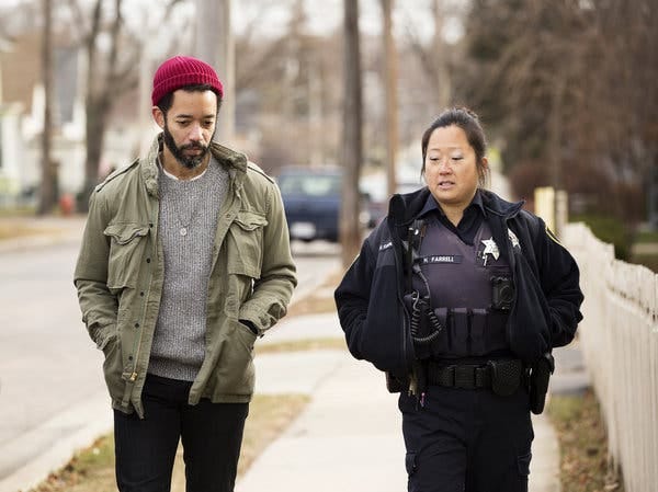 Cenac with Heather Farrell, a police officer in Elgin, Ill., in a segment from the show.