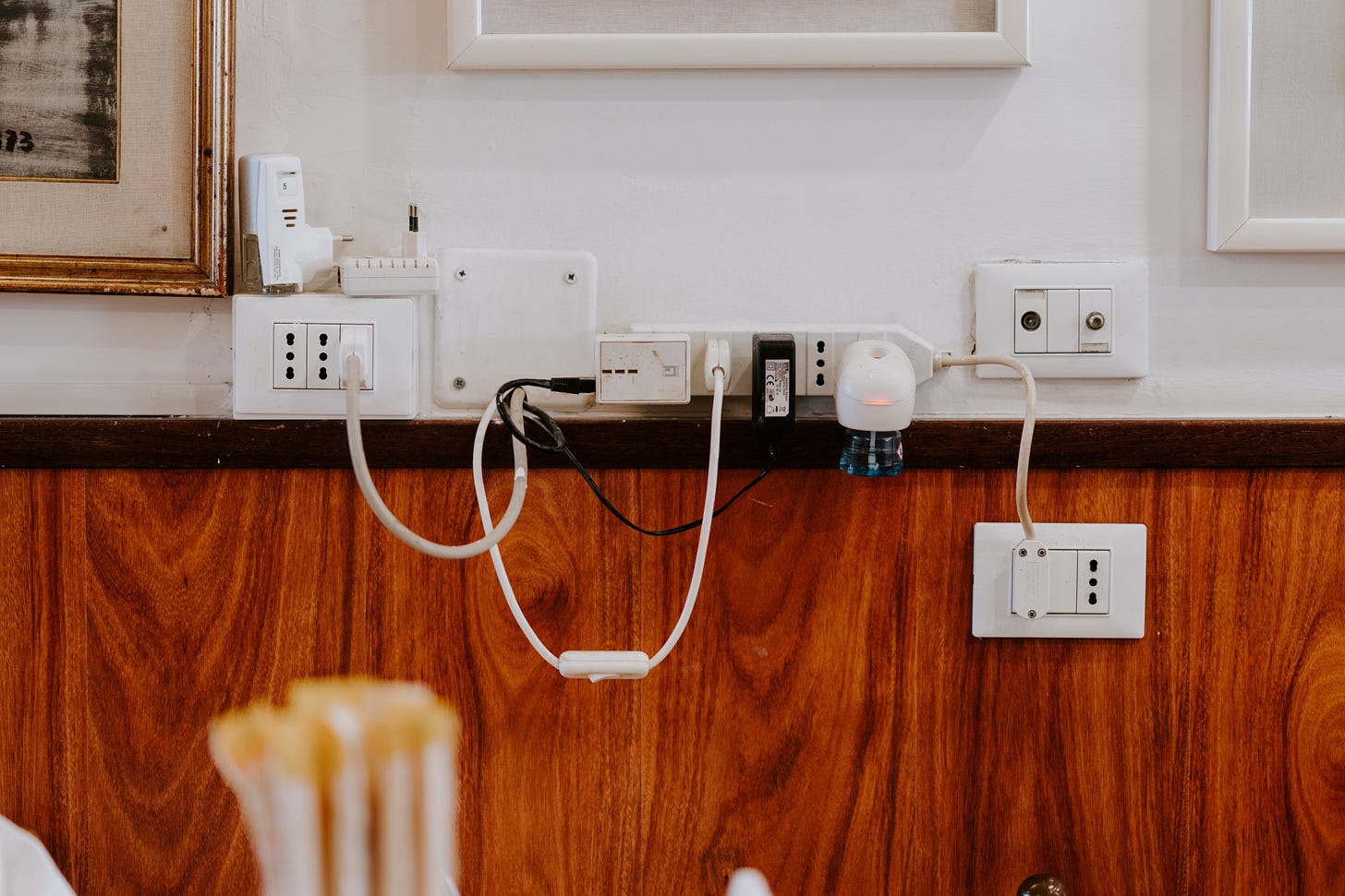 white power strip on brown wood white power strip on brown wood