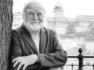 Image of mihaly csikszentmihalyi leaning against a tree Image of mihaly csikszentmihalyi leaning against a tree