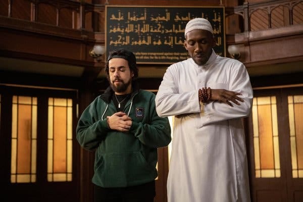 Ramy Youssef, left, with Mahershala Ali in a scene from Season 2 of “Ramy.” Unlike with a lot of previous portrayals of American Muslims, Youssef’s character is unafraid to display his faith.