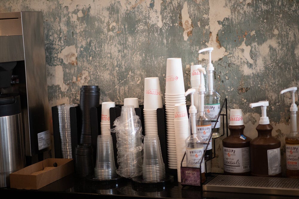 Behind the bar. Behind the bar.