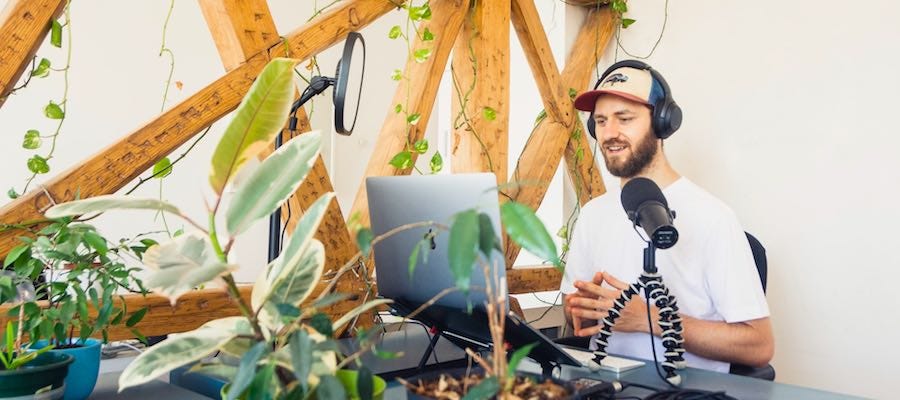 Man recording podcast Man recording podcast