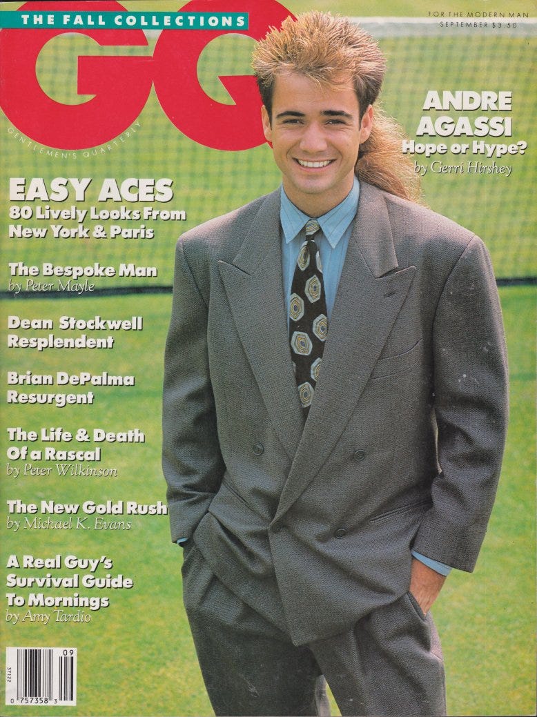 Andre Agassi standing on a grass tennis court in a bad suit with worse hair. Cover of GQ magazine September 1989 Andre Agassi standing on a grass tennis court in a bad suit with worse hair. Cover of GQ magazine September 1989
