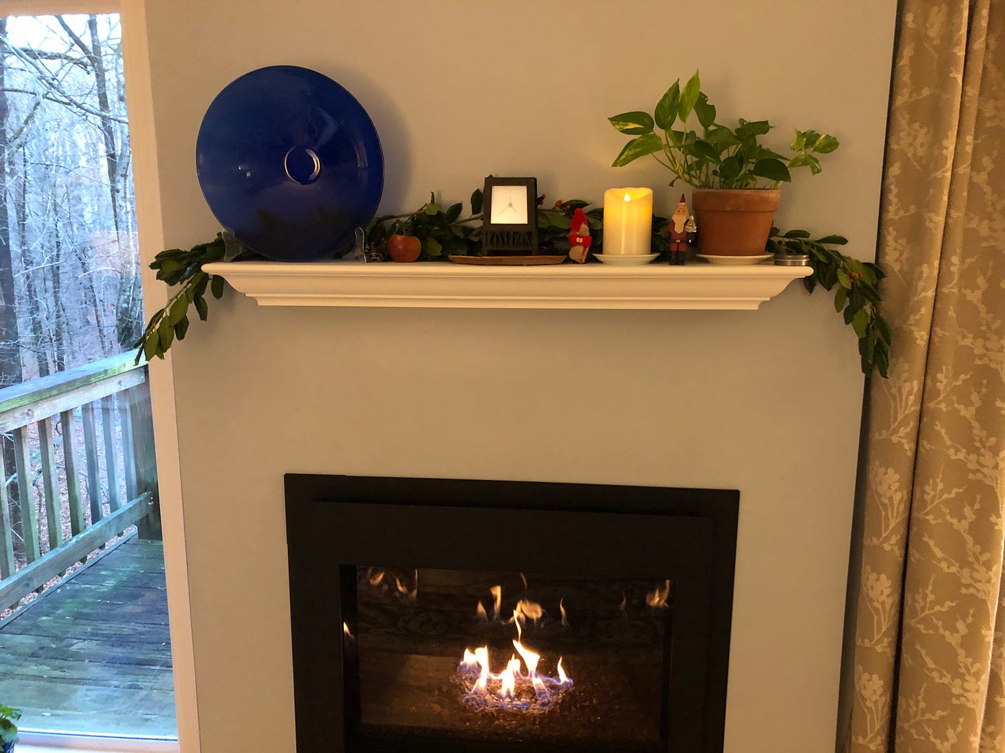 My fireplace mantel, literally decked with holly and Julenisse My fireplace mantel, literally decked with holly and Julenisse