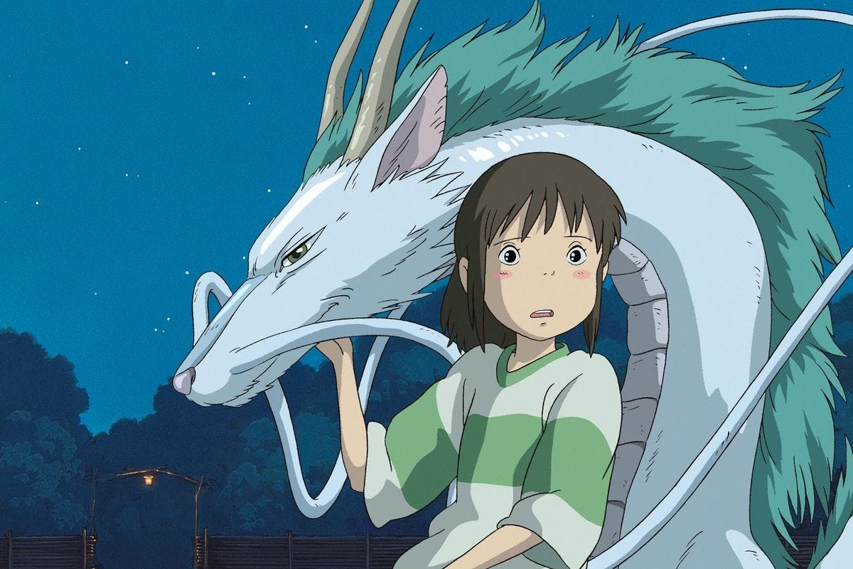 a young girl and a water dragon gasp at something off-screen in Spirited Away