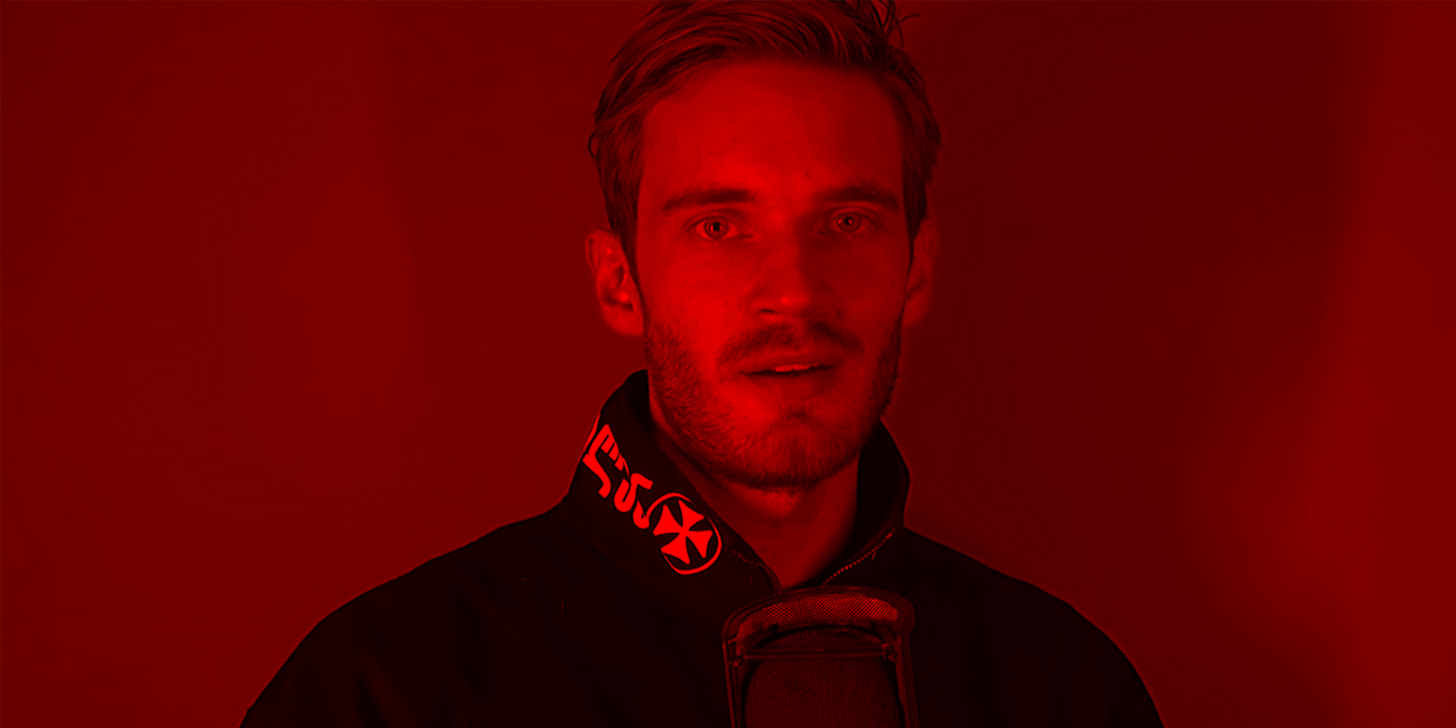 A screencap of PewDiePie wearing a sweater with the Iron Cross visible on its collar. A screencap of PewDiePie wearing a sweater with the Iron Cross visible on its collar.