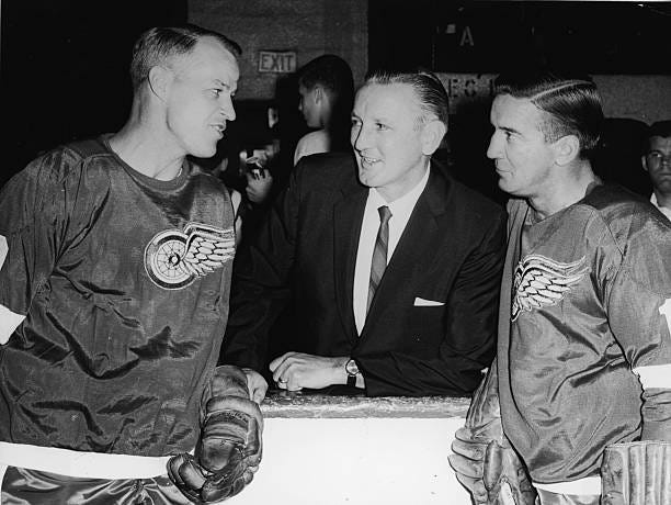 Ted Lindsay, Sid Abel , and Gordie Howie of the Detroit Red Wings, pose together before a game on October 15, 1964 at the Detroit Olympia in Detroit,...