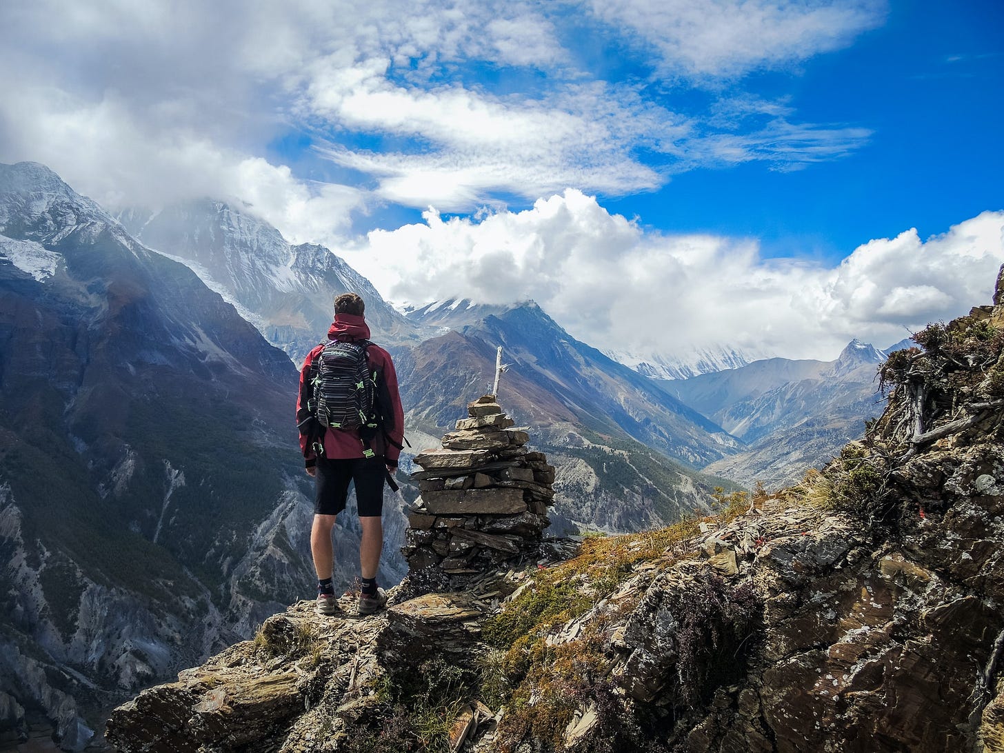 Hiker standing on mountain top