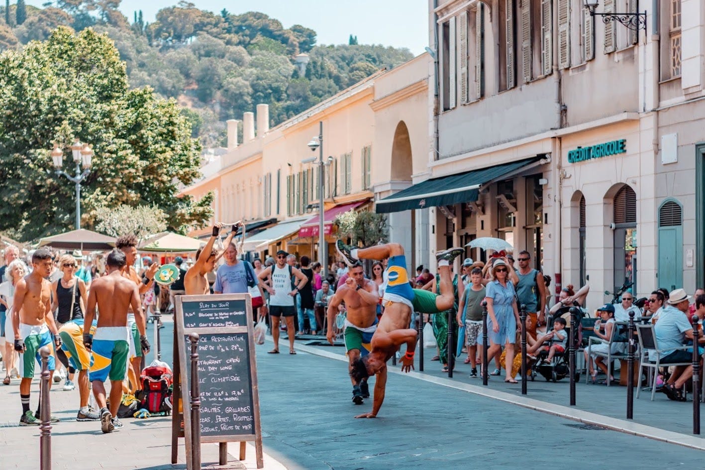 Street dancers performing on a busy street in Nice: A photo by David Elikwu