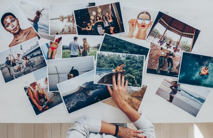 https://www.shutterstock.com/image-photo/top-view-photographer-selecting-best-photos-1398389936