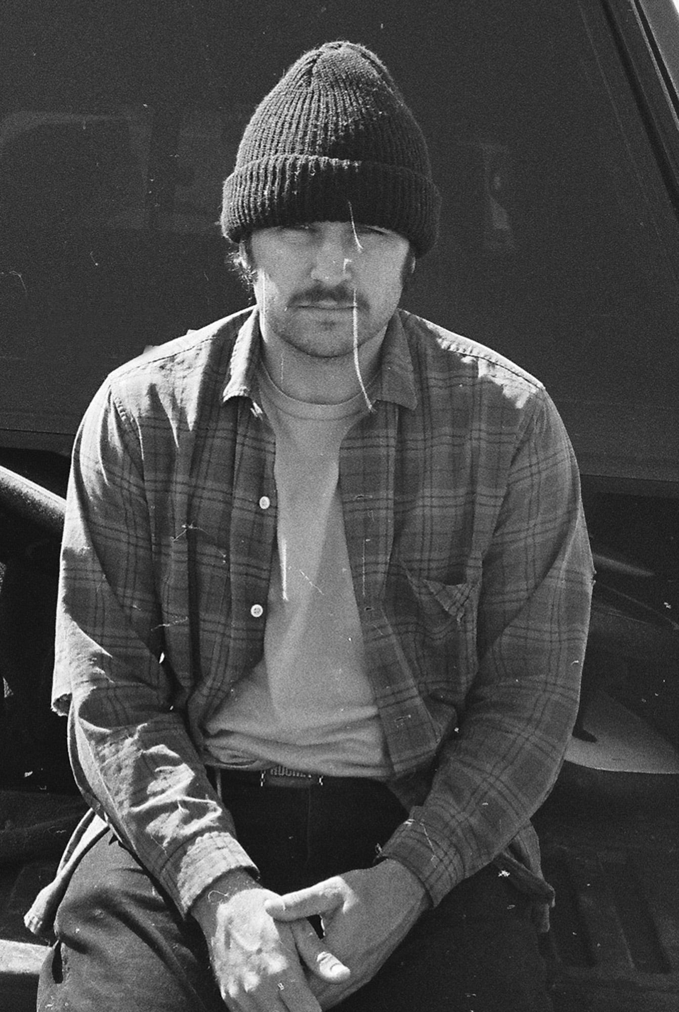 null A person in a black hat
Description automatically generated
