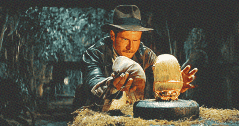 Indiana Jones waits for just the right time to replace the gold weight with his decoy.