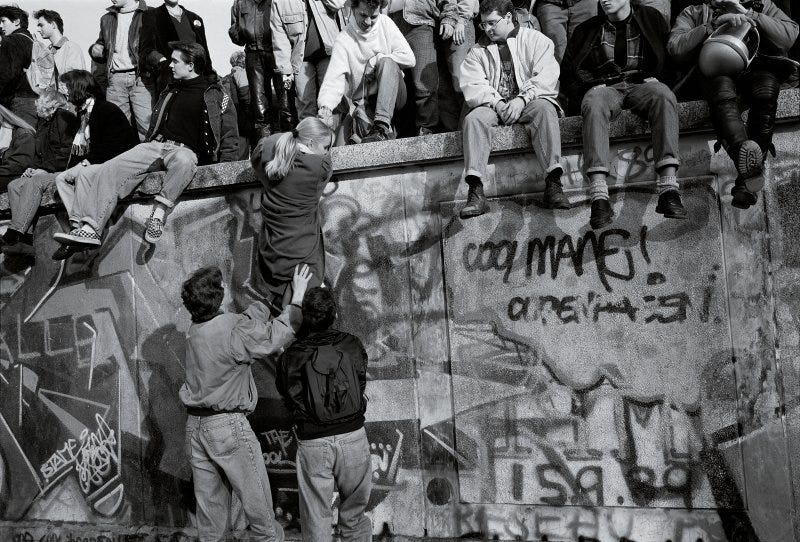 Crowds atop the Berlin Wall on the morning after it fell, Nov. 10, 1989.