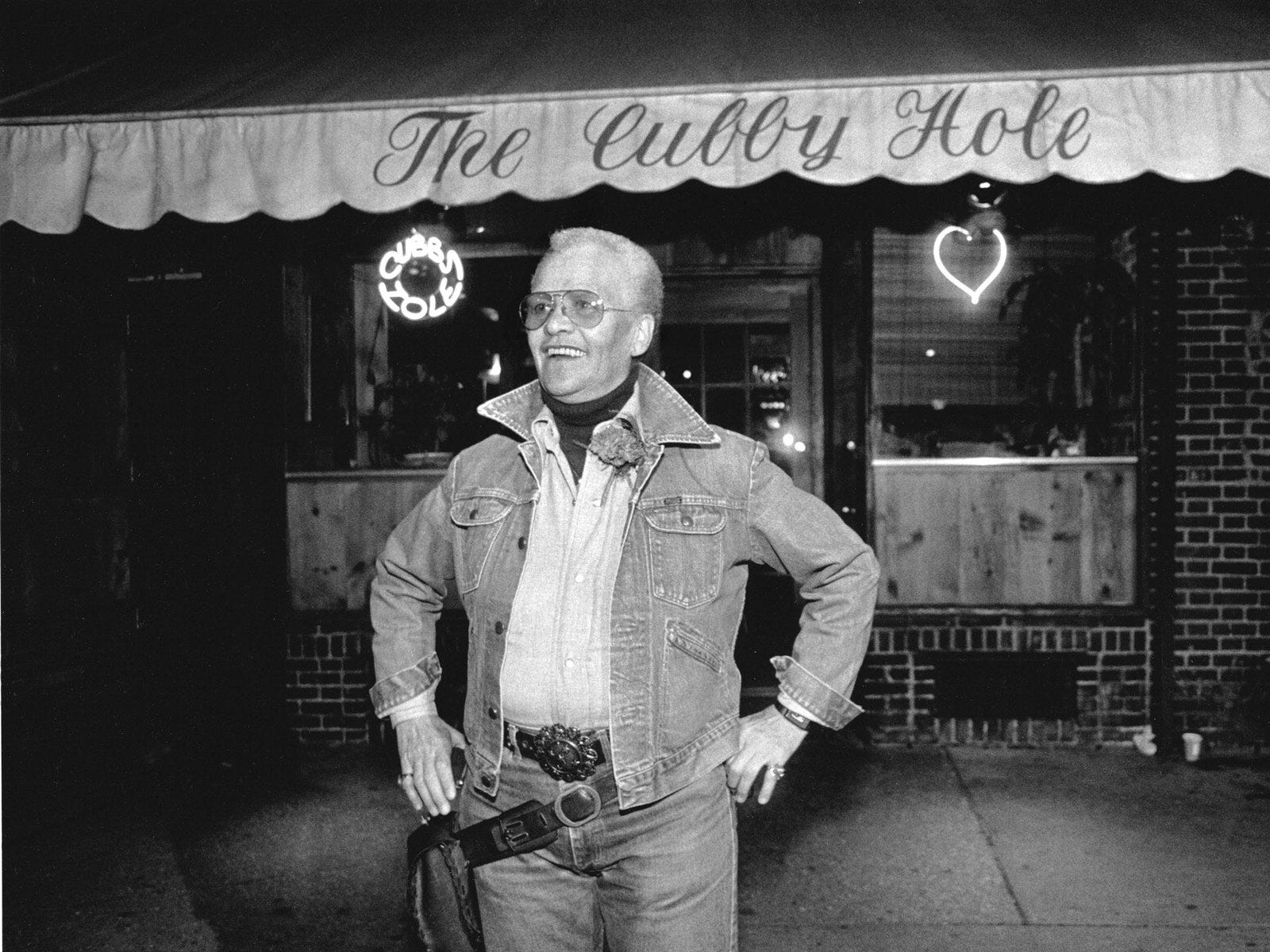 © 1986 JEB   Stormè DeLarverie working as a bouncer at The Cubby Hole Bar NYC 1986  silvergelatin print variable sizes....